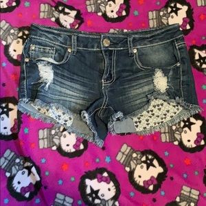 Rue 21 size 3/4 shorts with hearts on pockets